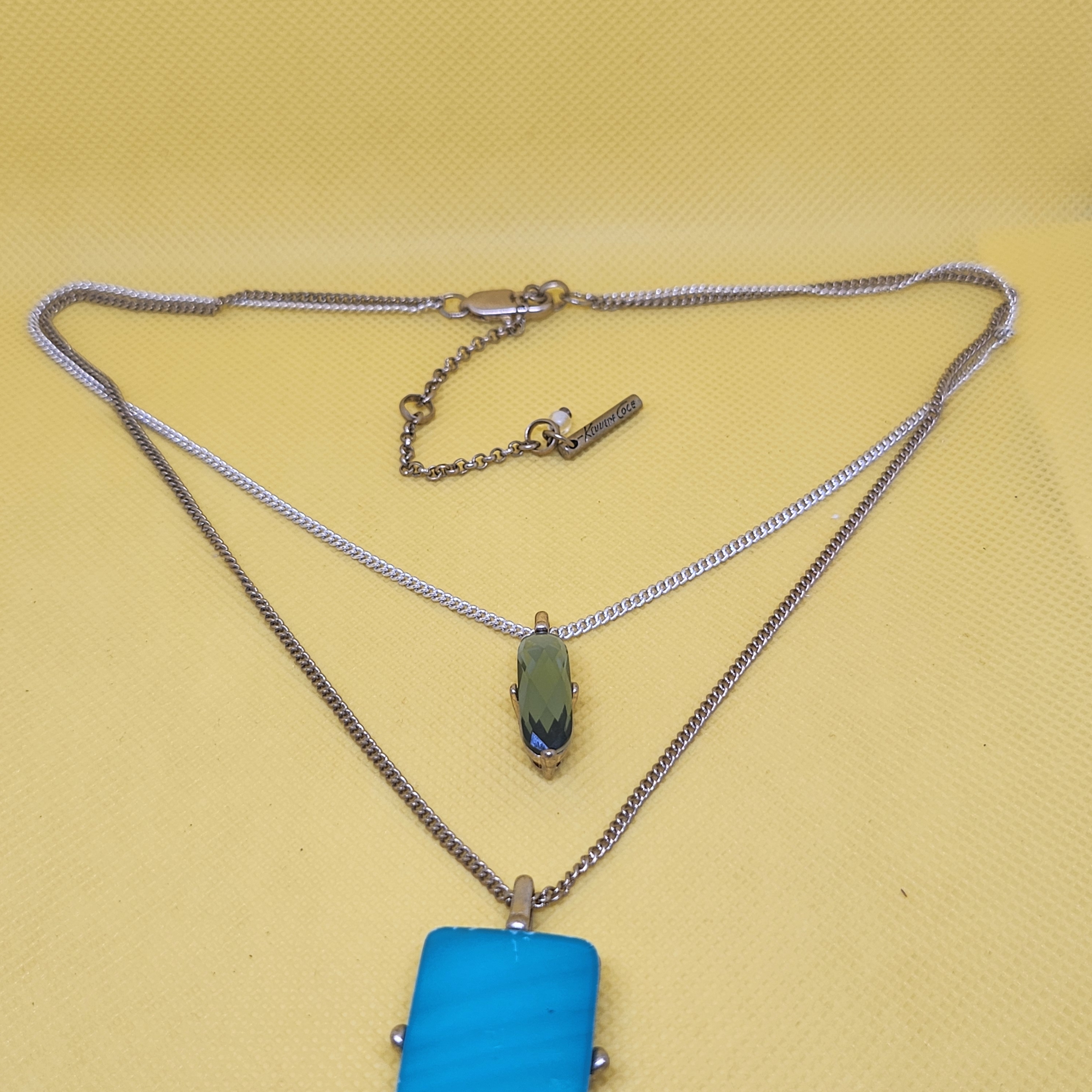 Kenneth Cole Silver Necklace With Blue Pendant 12$
